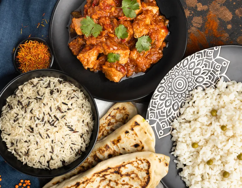 Chicken curry with rice and naan