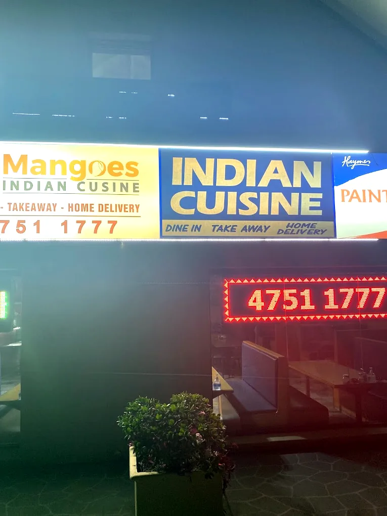 Shopfront and sign of Mangoes Indian Cuisine on the Great Western Highway, Valley Heights